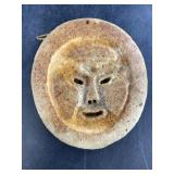 Wall hanging mask, carved from whalebone disk 5'
