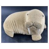 T. Kava whalebone carving of a seal with walrus iv