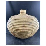Hooper Bay lidded course weave grass basket with d