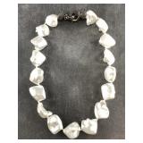 Large Baroque pearl necklace with a bedazzled hing