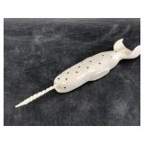 Ukaghhani ivory carving of a narwhale with fluted