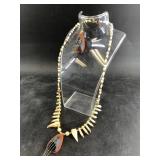 Set of jewelry: centerpieces resemble Tlingit hats