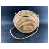 Unusual N.W. Alaskan coiled grass basket with loos