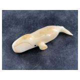 Ivory whale, missing its base 4'