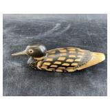 Adorable duck carved from a piece of horn, likely