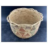 Kipnuk coiled grass basket with a braided rim and