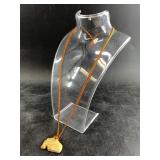 Ceramic fish pendant with cord