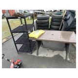 Lot of Two, outdoor Table and a plastic Rack