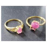 Pair of sterling silver rings with ruby size 7 1/2