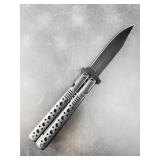 Spring assisted folding knife, handle imitates a b