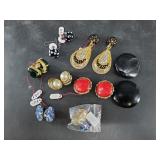 Several pair of fashion earrings