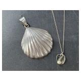 Sterling silver necklace with pearl pendant and a