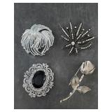 Lot of 4 silver-tone fashion brooches