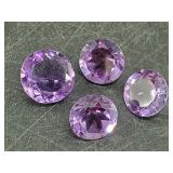 Loose amethyst gemstones faceted and polished, abo