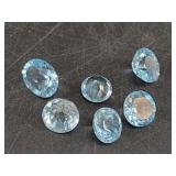Loose faceted and polished tourmaline gemstones, a