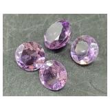 Loose amethyst gemstones faceted and polished, abo