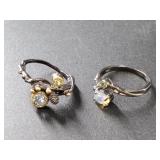 2 Sterling silver rings: 1 with opal, 1 with topaz