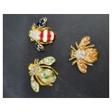 Lot with 3 Joan Rivers enameled bumble bee brooche