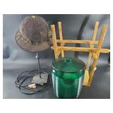Lot of home dï¿½cor with a stool that needs fixing