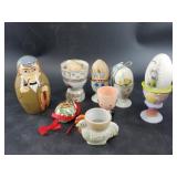 Collection of egg cups and a Sherlock Holmes nesti