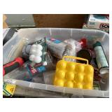 Plastic tote with Polaris Snow pants, plastic cups