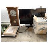 Large lot Including a tv, art, table clock, etc.