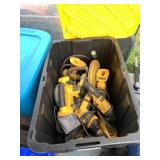 Plastic Tote Full of Dewault power tools, includin