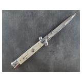 Italian made stiletto knife with white scales, tra