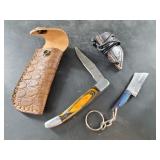 2  knives: 1 is a folder, 1 is a neck knife