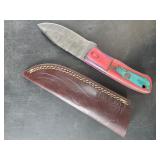 Damascus bladed knife with multi-colored handle an