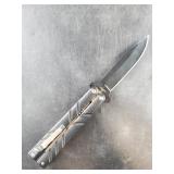 Spring assisted folding knife with push button rel