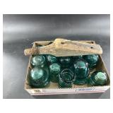 Dozen + Blue glass insulators
