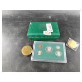 Lot with hearing protection, a 1997 mint proof set