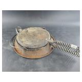 Antique Lodge #8 waffle iron with cradle in need o
