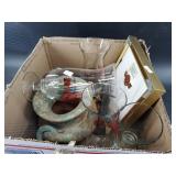 Assorted items including a pot, framed theater ad,