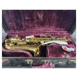 Grcisch sacksaphone in case. Has two reeds. Shows