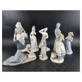 Several porcelain figurines from a variety of bran