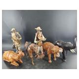 Antique figurines of people and animals. The anima