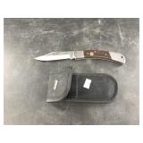 Coleman folding camp knife in nylon sheath