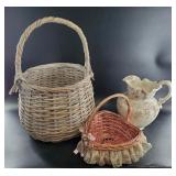 Porcelain pitcher with painted flowers and 2 baske
