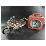 Desktop motorcycle and a vintage old town clock
