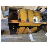 Antique dome top steamer trunk with unique colorin