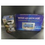 New in box Motion Aquarium light and a portable LE