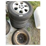 5 Tires all on rims, four are a set. See photos fo