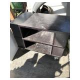 Small rolling cabinet can be coffee table or enter