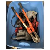 Tote full of power tools and hand tools including