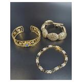 3 Bracelets: lovely tennis bracelet, etc.