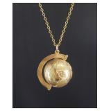 14kt Gold necklace, pendant with a spinning globe.