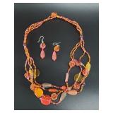 Hand beaded multi-strand necklace and earring set
