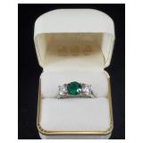 Sterling silver with vibrant green center stone, s